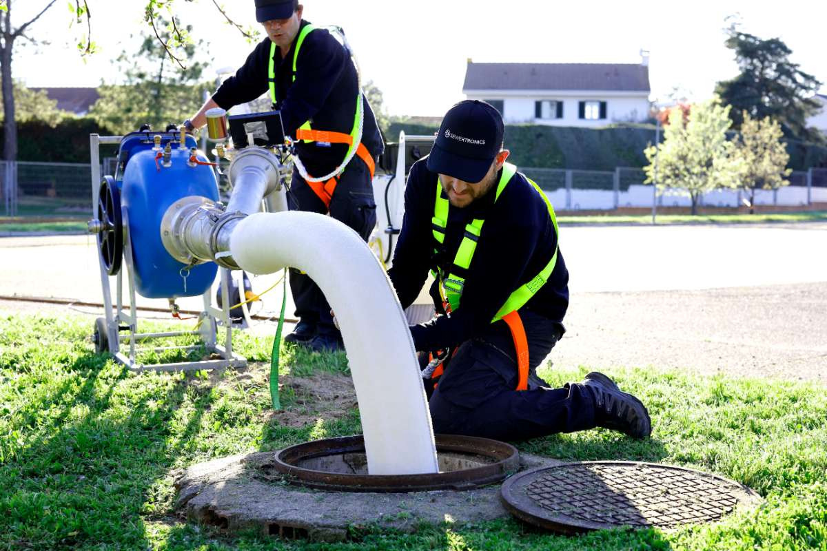 two engineers working with Sewertronics equipment